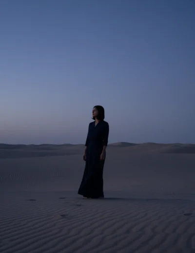 AI-generated image: Desert Portrait: Woman Silhouetted in Blue Hour Desert (Prompt)